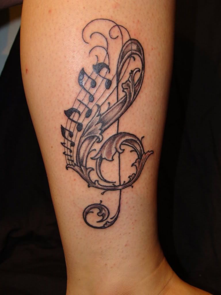 Treble clef tattoo