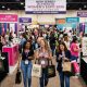 Women attending the New Jersey Ultimate Women's Expo 2026 at the New Jersey Expo Center in Edison, browsing fashion and beauty booths on the show floor